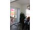 Dining room with sliding glass doors leading to backyard, and a table setting for a meal at 882 Brookshire Dr, Franklin, IN 46131