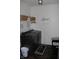 Laundry room with modern washer and dryer, decorative baskets, and laundry themed decor at 882 Brookshire Dr, Franklin, IN 46131