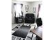 Well-appointed home office with a comfortable chair, stylish rug, and modern decor at 882 Brookshire Dr, Franklin, IN 46131