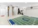 Finished basement featuring recreational space and workout equipment at 1817 Bellefontaine St, Indianapolis, IN 46202