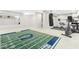 Finished basement featuring recreational space and workout equipment at 1817 Bellefontaine St, Indianapolis, IN 46202