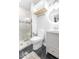 Modern bathroom featuring a walk-in shower and a vanity with sink at 1817 Bellefontaine St, Indianapolis, IN 46202