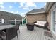 Outdoor deck featuring outdoor seating, a dining table, and a fire pit at 1817 Bellefontaine St, Indianapolis, IN 46202