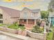 Charming brick home showcasing a well-manicured front yard, inviting front porch, and warm, classic architecture at 1817 Bellefontaine St, Indianapolis, IN 46202