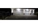 Exterior of the two-car garage featuring two doors and lighting at 1817 Bellefontaine St, Indianapolis, IN 46202