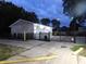 Exterior of the two-car garage featuring two doors and lighting at 1817 Bellefontaine St, Indianapolis, IN 46202