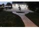 Exterior of the two-car garage featuring two doors, lighting, and a landscaped walkway at 1817 Bellefontaine St, Indianapolis, IN 46202
