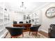 Well-lit home office with custom built-in shelving and a comfortable workspace at 1817 Bellefontaine St, Indianapolis, IN 46202