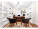 This stylish home office features custom built-in shelving and a large desk perfect for remote work at 1817 Bellefontaine St, Indianapolis, IN 46202