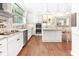 Modern kitchen with stainless appliances, granite countertops, sleek cabinetry and lots of light at 1817 Bellefontaine St, Indianapolis, IN 46202