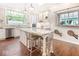 Eat in kitchen offers stainless steel appliances, granite countertops and custom white cabinetry at 1817 Bellefontaine St, Indianapolis, IN 46202