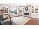 Inviting living room featuring a fireplace, built-in shelves, hardwood floors, and stylish decor at 1817 Bellefontaine St, Indianapolis, IN 46202