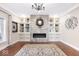 Bright living room featuring a modern fireplace with built-in shelves, hardwood floors, and elegant decor at 1817 Bellefontaine St, Indianapolis, IN 46202