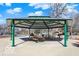 A clean and open Picnic Pavilion with seating for many guests in the community park at 1817 Bellefontaine St, Indianapolis, IN 46202