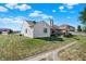 View of a backyard featuring a patio with outdoor seating and a fire pit at 828 Ashton Park Dr, Greenwood, IN 46143