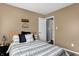 Inviting bedroom with a decorative wall sign, soft bedding, and ample natural light for a restful ambiance at 828 Ashton Park Dr, Greenwood, IN 46143