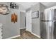 Bright kitchen with stainless steel appliances and wood-look flooring at 828 Ashton Park Dr, Greenwood, IN 46143