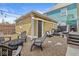 Backyard with deck, gravel area, chairs and firepit, perfect for entertaining at 1019 Central Ave, Indianapolis, IN 46202