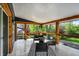 Covered porch with outdoor furniture and overhead lighting at 22 W 54Th St, Indianapolis, IN 46208