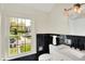 Elegant bathroom featuring a large window, modern fixtures, and a sleek design at 22 W 54Th St, Indianapolis, IN 46208