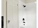 Full bathroom with a shower/tub combo, tile surround, and updated fixtures at 22 W 54Th St, Indianapolis, IN 46208