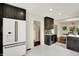 View of kitchen with stainless steel appliances, a wine cooler, and an open layout, great for entertaining guests at 22 W 54Th St, Indianapolis, IN 46208