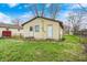 Detached building with grass, blue sky, and bare trees at 120 Hugo St, Indianapolis, IN 46229
