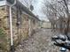 Brick home with backyard, storage shed, and mature trees at 6602 Lennington Dr, Indianapolis, IN 46226