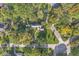 Aerial view of house and property showcasing landscaping and location at 6996 N Washington Blvd, Indianapolis, IN 46220