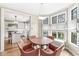 Kitchen breakfast nook with round table and chairs, adjacent to kitchen at 6996 N Washington Blvd, Indianapolis, IN 46220