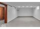 Unfinished basement with painted walls and concrete flooring at 4807 Graceland Ave, Indianapolis, IN 46208