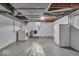 Spacious basement with washer, dryer, and extra refrigerator at 4807 Graceland Ave, Indianapolis, IN 46208