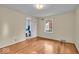 Bedroom with hardwood floors and a bathroom at 4807 Graceland Ave, Indianapolis, IN 46208