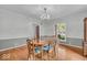 Traditional dining room with hardwood floors, chandelier, and classic wood table with seating at 4807 Graceland Ave, Indianapolis, IN 46208