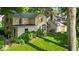 Rear exterior of home with large yard at 4807 Graceland Ave, Indianapolis, IN 46208