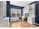 Stylish home office with built-in shelves, storage, and a comfortable window seat at 8418 Mesic Ct, Indianapolis, IN 46278