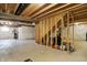 Spacious unfinished basement with exposed wood beams and utilities ready to be personalized at 612 Reunion Ln, Greenwood, IN 46143