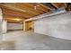 Large unfinished basement featuring exposed beams and plastic-covered walls, awaiting personalization at 612 Reunion Ln, Greenwood, IN 46143
