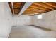 Unfinished basement showing concrete floor, insulated walls, and open ceiling ready to be finished at 612 Reunion Ln, Greenwood, IN 46143