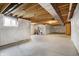 Unfinished basement featuring concrete floor, exposed wood ceiling and insulated walls, ready to be customized at 612 Reunion Ln, Greenwood, IN 46143