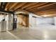 Spacious unfinished basement with exposed ceiling beams and utilities ready to be personalized at 612 Reunion Ln, Greenwood, IN 46143