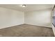 Spacious bedroom with neutral walls, plush carpeting and a large window letting in natural light at 612 Reunion Ln, Greenwood, IN 46143