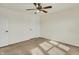 Bedroom featuring carpet, a ceiling fan, and a white closet door at 612 Reunion Ln, Greenwood, IN 46143