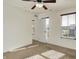 Bedroom with neutral carpet, ceiling fan, and natural light from windows at 612 Reunion Ln, Greenwood, IN 46143
