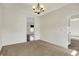 Neutral dining room showing view into other rooms and simple elegance at 612 Reunion Ln, Greenwood, IN 46143