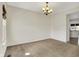 Spacious dining room featuring neutral tones and a stylish chandelier at 612 Reunion Ln, Greenwood, IN 46143