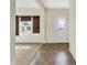 Inviting entryway featuring neutral carpet and tile flooring, along with a front door with decorative glass at 612 Reunion Ln, Greenwood, IN 46143