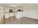 Open kitchen and dining area featuring granite countertops and stainless appliances at 612 Reunion Ln, Greenwood, IN 46143