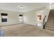 Spacious living room with staircase and hallway at 612 Reunion Ln, Greenwood, IN 46143