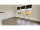 Bright sunroom featuring tile floors, neutral paint, and large windows with backyard views at 612 Reunion Ln, Greenwood, IN 46143